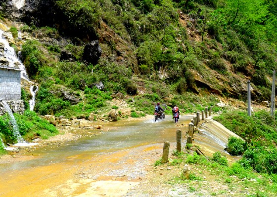 Whoopsie Daisy! Lift your feet when navigating the road waterfalls!