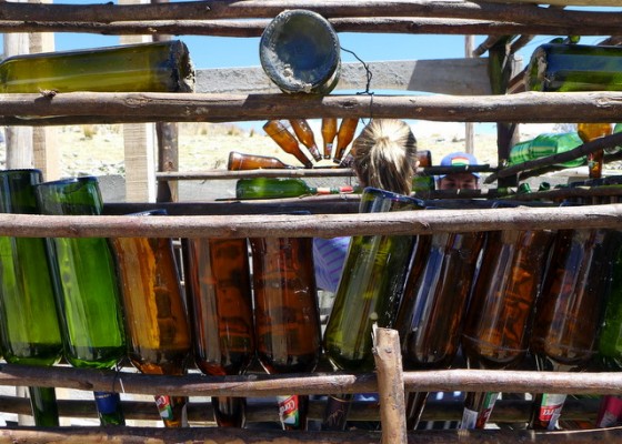 Recycled glass bottles forming the windows in our bathroom