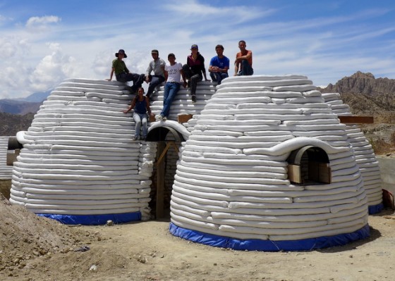 Our crew taking a break on top of the superadobe housing units