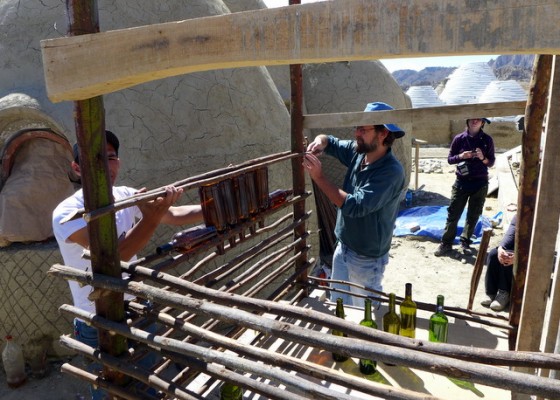 Elizandro (left) helping us build out the bathroom walls