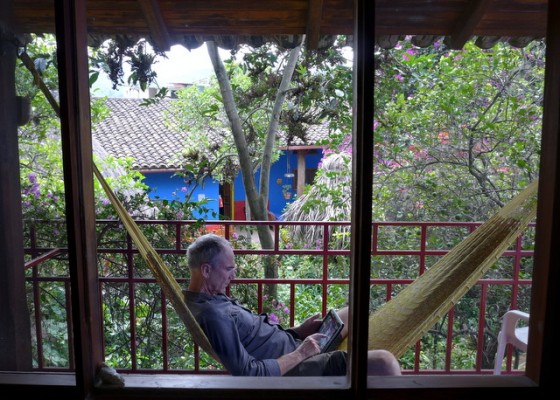 Paul lounging on our comfortable balcony