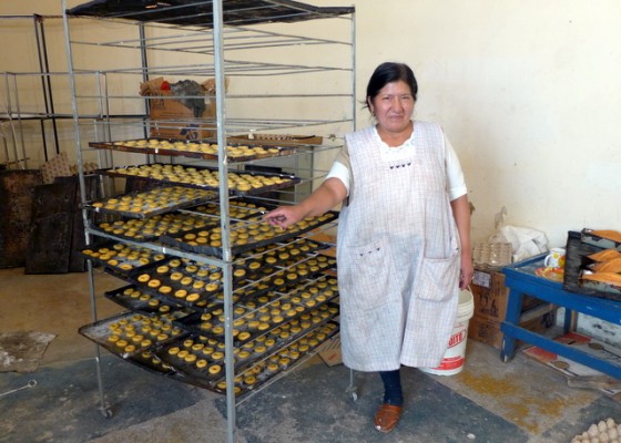 Celestina, a Kiva borrower, in her bakery