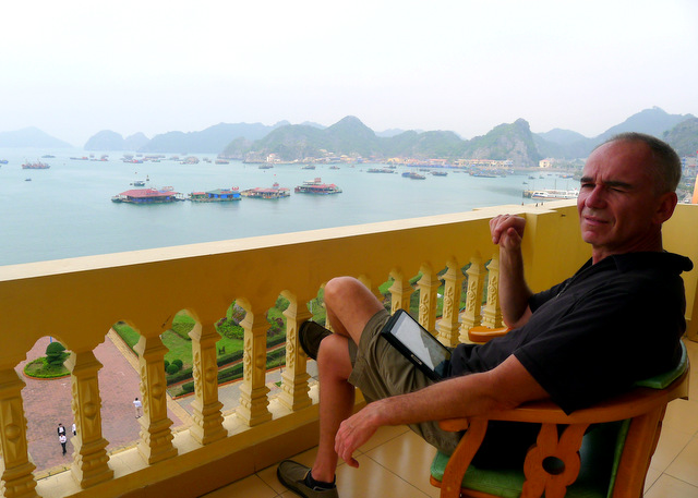 Paul taking in the view from our hotel room balcony in Cat Ba, Vietnam.