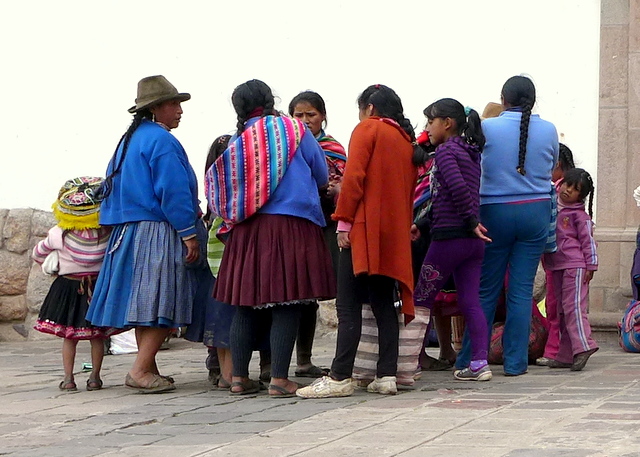 Cusqueña women gather in the streets of Cusco