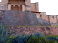 The less-impressive Church of Santo Domingo built atop the graceful stone walls of Cusco\'s Golden Temple