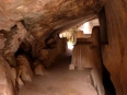 A cavernous sacred altar located inside the craggy depths of Q\'enqo