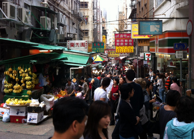 Busy market streets of Hong Kong, little elbow room outside of the green spaces