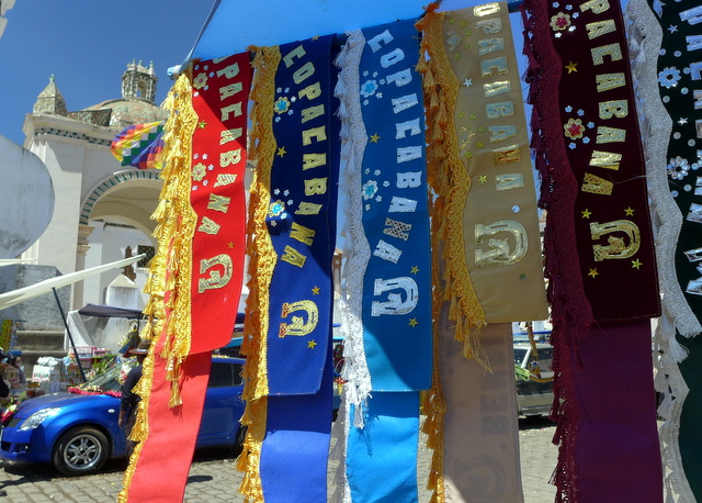 Banners showing the vehicle was blessed at the revered Basilica of Our Lady of Copacabana