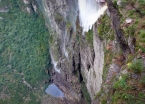 Peering over the edge at Cachoeira da Fumaça’s 420 m (1400 ft) drop – Brazil’s tallest waterfall.