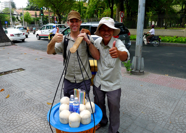 Getting to know the local street vendors.  Chilled sweet coconut juice is a delicious, nutritious way to hydrate.