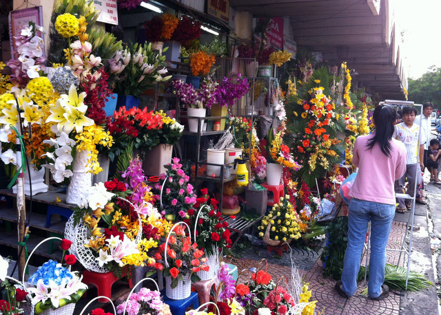 The central market in HCMC hosts a colorful display of foods, fragrances and flowers.