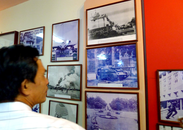 Display of photos of the taking of the Presidential Palace at the end of the Vietnam War.  Note the tanks crashing through the front gates, signaling the end of the Republic of Viet Nam.