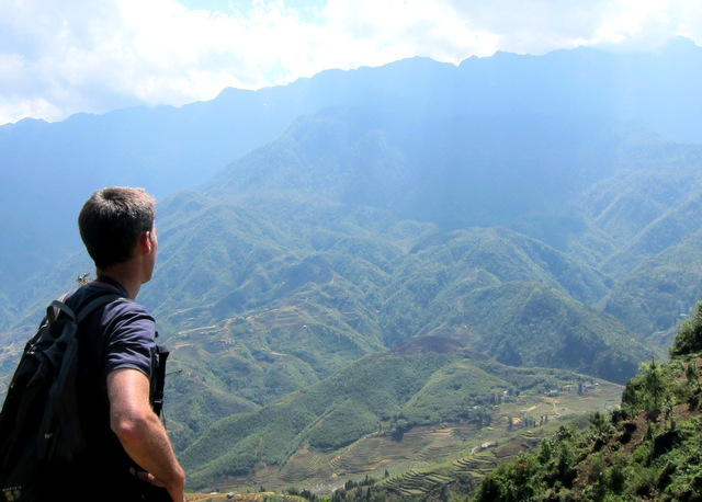 Me contemplating the mountains, with Fanispan (the highest point in Vietnam and Indochina) on my mind