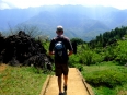 Paul on a part path facing the impressive Hoang Lien Son mountain range