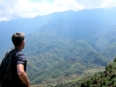 Me contemplating the mountains, with Fanispan (the highest point in Vietnam and Indochina) on my mind