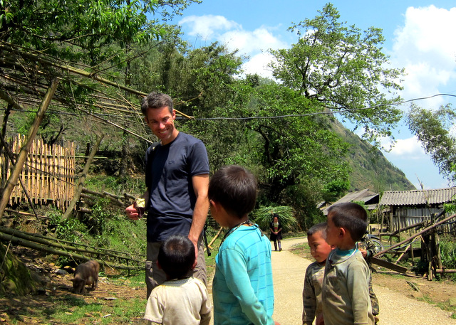Smiling at the village youngsters in Sin Chai wondering why on earth I would feed the pot-belly pigs bread (I had dropped the loaf on the ground earlier so it was sullied)
