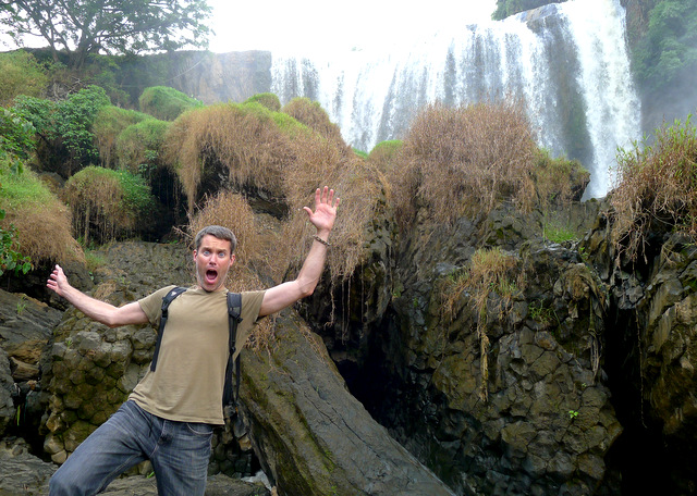 Slippery When Wet! Losing my balance in front of one of the many gushing waterfalls in Vietnam\'s Central Highlands