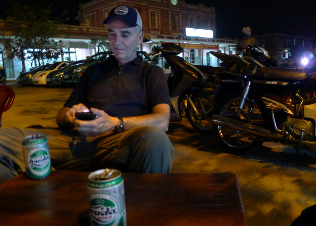 Waiting in Hué for the night train to Hanoi, with a couple cans of locally brewed Huda beer to keep us hydrated